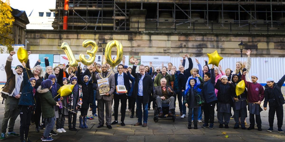 People outside the Harris celebrating its 130th birthday