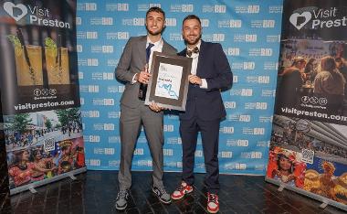 Two men presented with an award at the Preston’s ‘High Street Heroes awards.